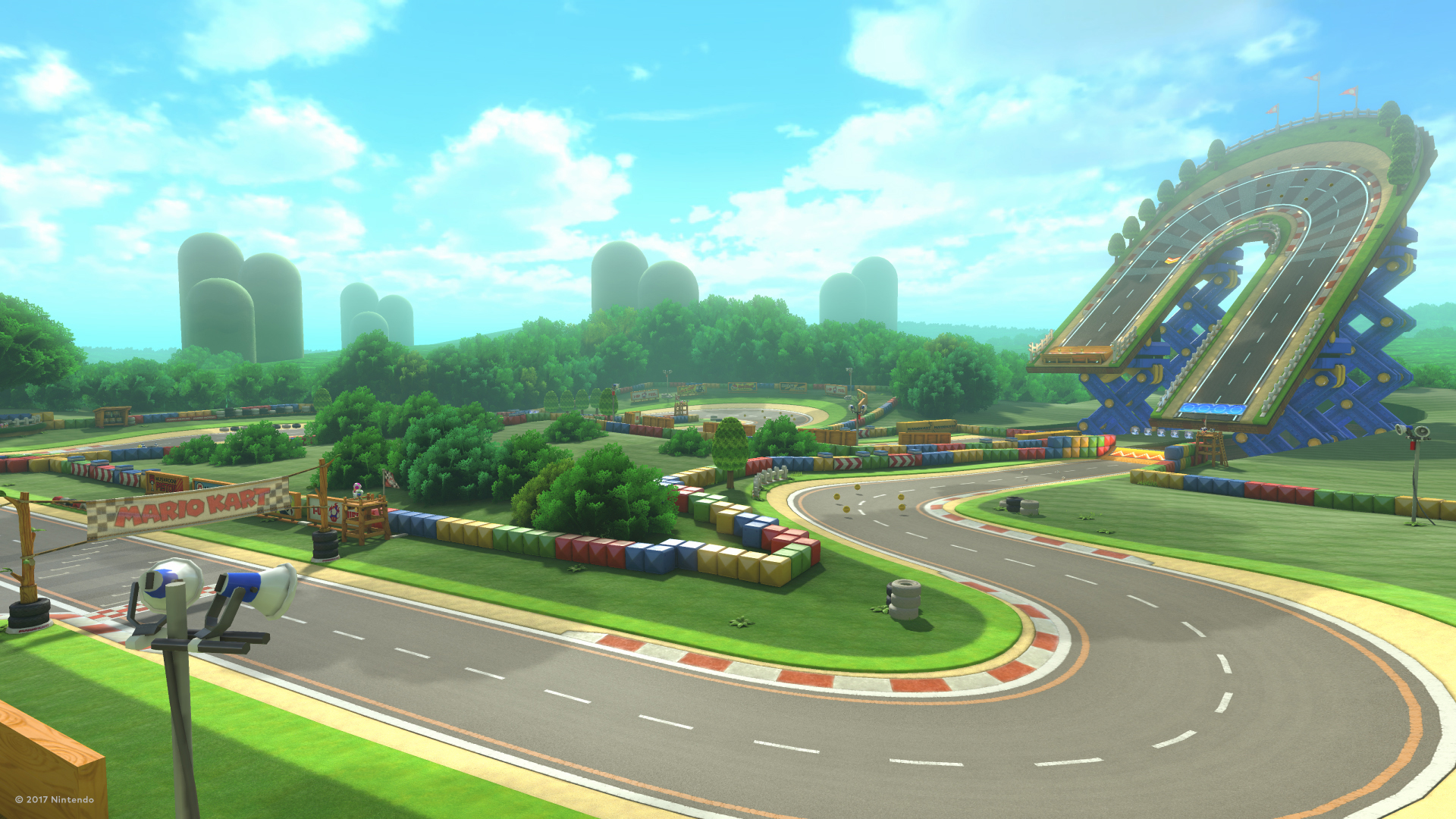 Sur cette image on peut apercevoir mario entrain de faire une course en ligne avec plusieurs joueurs